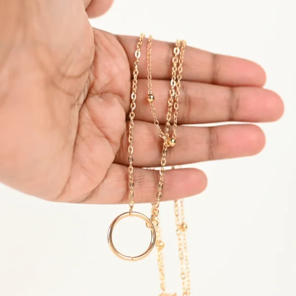 Double-chain necklace with a modern twist. Features two delicate chains intertwined for a unique look. Shop online at cute funny stuff store Toronto Ontario Canada