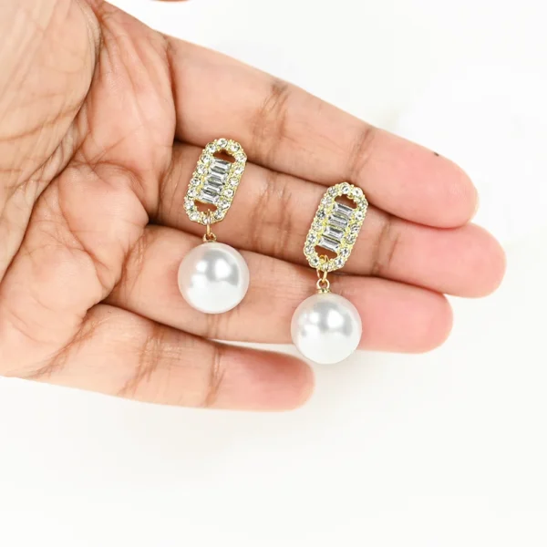 White Drop Pearl Earrings. Perfect for date night earrings. Drop earrings for sale! Best novelty gift shop. Shop Online for cute stud earrings at Cutefunnystuff.com Hot selling products. Cute Funny Products, Gift shop online. Toronto Ontario Canada