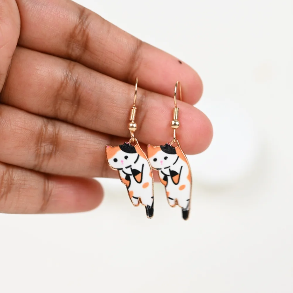 Hanging Orange Cat Drop earrings. Drop Earrings for sale! Shop Online for cute earrings at Cutefunnystuff.com Hot selling products. Cute Funny Products, Gift shop online. Novelty Shop Online. Toronto Ontario Canada